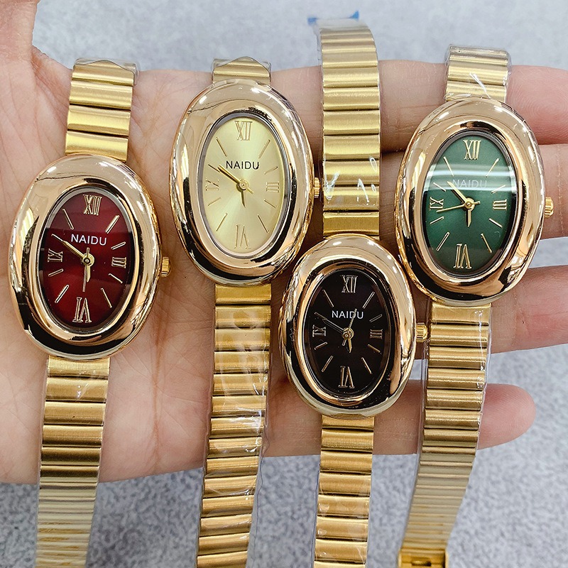 Luxury Watch Index - Reloj de cuarzo ovalado dorado de